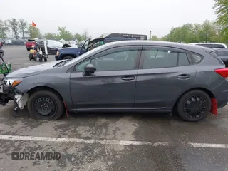 2019 Subaru Impreza with VIN 4S3GTAA69K1711062, listed as a IAAI auction lot 42187136 with 91,423 mi miles and . Bid and sale history available at DreamBid. Image 14.