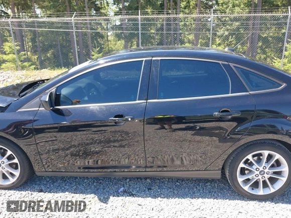 2018 Ford Focus SE z VIN 1FADP3FE5JL279274, wystawiony jako IAAI lot #42626587 z przebiegiem 92 110 mil mil oraz . Historia ofert i sprzedaży dostępna na DreamBid. Obrazek 15.