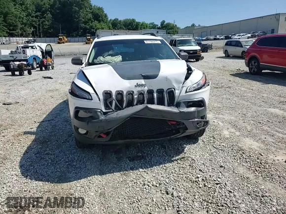 2015 Jeep Cherokee Trailhawk with VIN 1C4PJMBS0FW705288, listed as a Copart auction lot 61796275 with 133,874 mi miles and Salvage title. Bid and sale history available at DreamBid. Image 14.