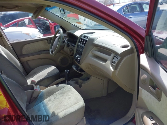 2007 Kia Sportage LX with VIN KNDJF724577371572, listed as a IAAI auction lot 41817960 with 213,062 mi miles. Bid and sale history available at carsss.com. Image 5.