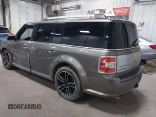 2014 Ford Flex Limited z VIN 2FMHK6DT2EBD25030, wystawiony jako IAAI lot #42148170 z przebiegiem 135 300 mil mil oraz . Historia ofert i sprzedaży dostępna na DreamBid. Obrazek 3.