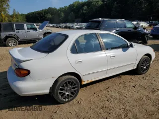 2000 Hyundai Elantra GLS z VIN KMHJF35F8YU922503, wystawiony jako Copart lot #71063234 z przebiegiem 209 706 mil mil oraz Czysty tytuł • Clean title. Historia ofert i sprzedaży dostępna na DreamBid. Obrazek 3.