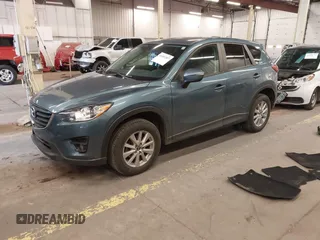 2016 Mazda CX-5 Touring z VIN JM3KE4CY2G0839202, wystawiony jako IAAI lot #41901207 z przebiegiem 65 449 mil mil oraz . Historia ofert i sprzedaży dostępna na DreamBid. Obrazek 2.