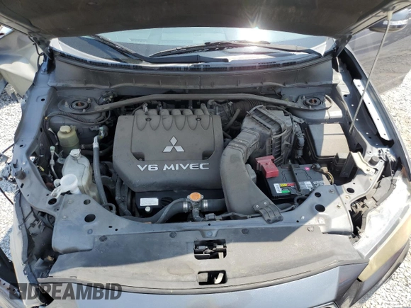 2010 Mitsubishi Outlander XLS z VIN JA4JS4AX2AZ014121, wystawiony jako Copart lot #56403435 z przebiegiem 119 121 mil mil oraz Nie do naprawy • Non repairable. Historia ofert i sprzedaży dostępna na DreamBid. Obrazek 12.