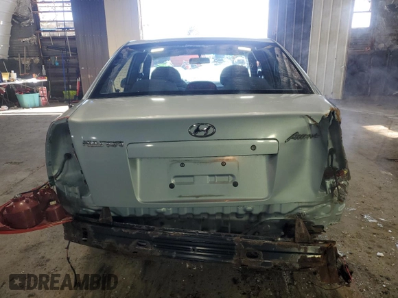 2005 Hyundai Accent GLS with VIN KMHCG45C15U602419, listed as a Copart auction lot 47759675 with 58,133 mi miles and Salvage Title. Bid and sale history available at carsss.com. Image 6.
