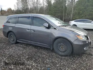 2014 Honda Odyssey Touring z VIN 5FNRL5H98EB512144, wystawiony jako Copart lot #69987533 z przebiegiem 184 231 mil mil oraz Szkoda całkowita • Salvage title. Historia ofert i sprzedaży dostępna na DreamBid. Obrazek 4.