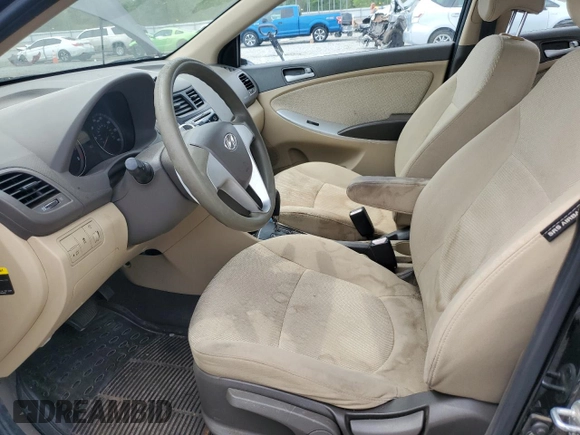2012 Hyundai Accent GLS z VIN KMHCT4AEXCU041024, wystawiony jako Copart lot #54057455 z przebiegiem 219 530 mil mil oraz Szkody całkowita. Historia ofert i sprzedaży dostępna na DreamBid. Obrazek 7.