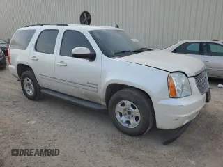 2012 GMC Yukon SLT with VIN 1GKS1CE03CR287810, listed as a Copart auction lot 73743304 with 206,122 mi miles and Salvage Title. Bid and sale history available at carsss.com. Image 4.