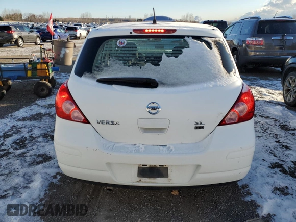 2009 Nissan Versa 1.8 S with VIN 3N1BC13E49L496601, listed as a Copart auction lot 41742045 with 199,039 mi miles and Salvage Title. Bid and sale history available at carsss.com. Image 6.