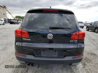 2014 Volkswagen Tiguan SE with VIN WVGAV3AXXEW543245, listed as a Copart auction lot 42288905 with 92,851 mi miles and Salvage title. Bid and sale history available at DreamBid. Image 6.