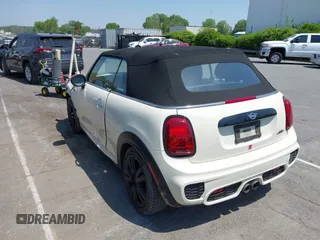 2021 MINI Convertible with VIN WMWWJ9C0XM3M07302, listed as a IAAI auction lot 42027854 with 30,921 mi miles and . Bid and sale history available at DreamBid. Image 3.