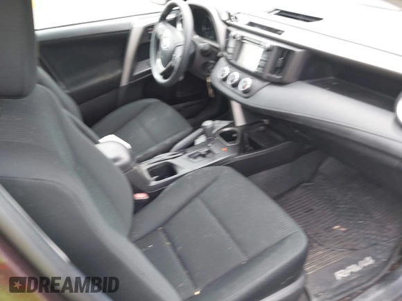 2018 Toyota RAV4 LE with VIN 2T3BFREV9JW771845, listed as a IAAI auction lot 42108641 with 127,394 mi miles. Bid and sale history available at carsss.com. Image 5.