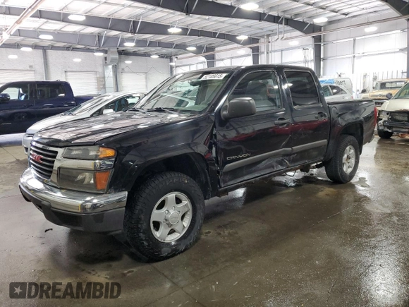2004 GMC Canyon 1SB SLE Z85 with VIN 1GTDT136348114628, listed as a Copart auction lot 52105615 with 244,232 mi miles and Salvage Title. Bid and sale history available at carsss.com. Image 1.