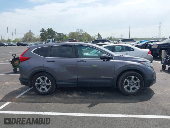 2017 Honda CR-V EX-L with VIN 7FARW1H89HE002384, listed as a IAAI auction lot 41908640 with 131,229 mi miles. Bid and sale history available at carsss.com. Image 13.