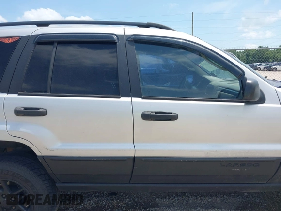 2002 Jeep Grand Cherokee Laredo with VIN 1J4GX48S32C288387, listed as a IAAI auction lot 42212249 with 151,028 mi miles and . Bid and sale history available at DreamBid. Image 14.
