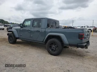 2024 Jeep Gladiator Sport S with VIN 1C6HJTAG2RL125730, listed as a Copart auction lot 60064095 with 10,173 mi miles and Salvage title. Bid and sale history available at DreamBid. Image 2.