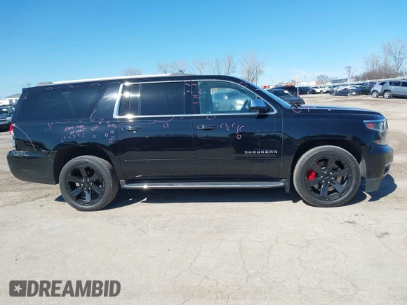 2017 Chevrolet Suburban Premier with VIN 1GNSKJKC8HR285321, listed as a IAAI auction lot 41796659 with 128,113 mi miles and . Bid and sale history available at DreamBid. Image 13.