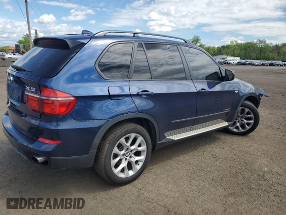 2012 BMW X5 35i with VIN 5UXZV4C56CL754643, listed as a Copart auction lot 55970125 with 150,584 mi miles and Salvage title. Bid and sale history available at DreamBid. Image 3.