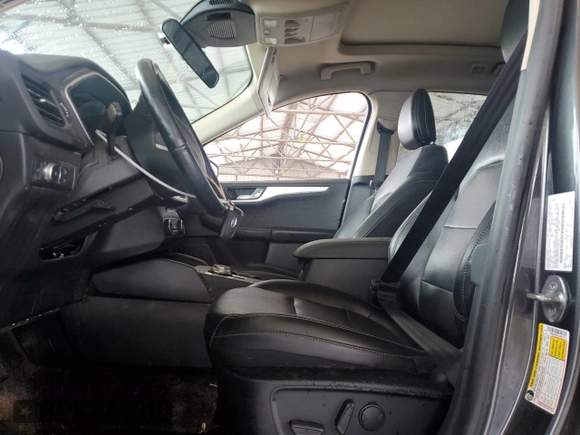 2020 Ford Escape SEL с VIN 1FMCU0H67LUA67410, выставлен на аукционе Copart как лот 51210715 с пробегом 132 535 миль миль и Списание • Salvage title. История ставок и продаж доступна на DreamBid. Изображение 7.