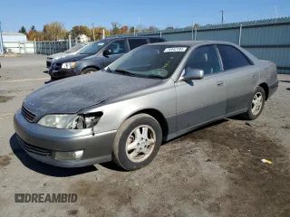 2000 Lexus ES 300 with VIN JT8BF28GXY5091263, listed as a Copart auction lot 61767595 with 250,041 mi miles and Salvage title. Bid and sale history available at DreamBid. Image 1.