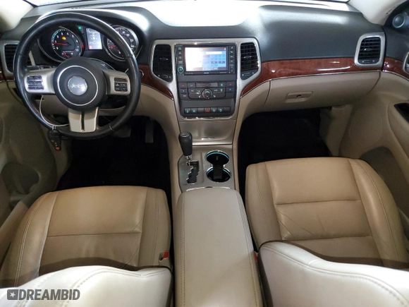 2012 Jeep Grand Cherokee Limited with VIN 1C4RJFBTXCC189998, listed as a Copart auction lot 87547735 with 207,167 mi miles and Salvage Title. Bid and sale history available at carsss.com. Image 8.