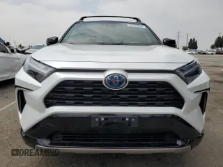 2024 Toyota RAV4 Hybrid XSE with VIN 4T3E6RFV0RU141591, listed as a Copart auction lot 59623085 with 27,682 mi miles and Salvage title. Bid and sale history available at DreamBid. Image 5.