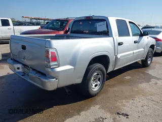 2007 Mitsubishi Raider LS with VIN 1Z7HC28K57S161586, listed as a IAAI auction lot 41864742 with 212,817 mi miles. Bid and sale history available at carsss.com. Image 4.