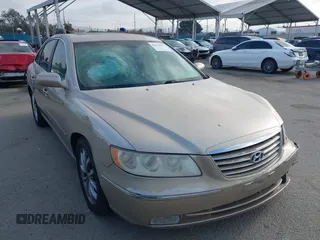 2006 Hyundai Azera SE z VIN KMHFC46F56A095397, wystawiony jako IAAI lot #42135597 z przebiegiem 182 416 mil mil oraz . Historia ofert i sprzedaży dostępna na DreamBid. Obrazek 1.