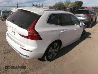 2022 Volvo XC60 Recharge Plug-In Hybrid Inscription with VIN YV4BR0DL8N1977341, listed as a IAAI auction lot 34114187 with 10,593 mi miles. Bid and sale history available at carsss.com. Image 4.