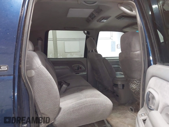 1999 Chevrolet Suburban with VIN 3GNEC16RXXG237570, listed as a IAAI auction lot 40210234 with 176,902 mi miles. Bid and sale history available at carsss.com. Image 8.