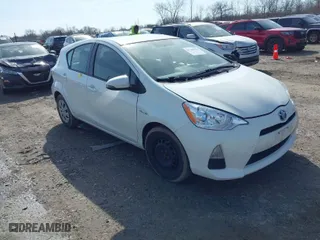 2014 Toyota Prius c One with VIN JTDKDTB36E1573184, listed as a IAAI auction lot 41780410 with 124,178 mi miles. Bid and sale history available at carsss.com. Image 1.