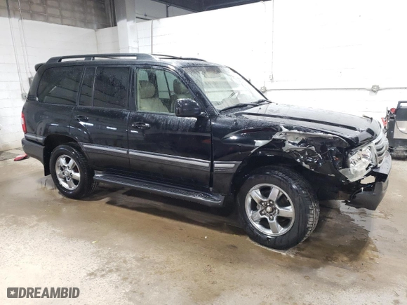 2006 Toyota Land Cruiser with VIN JTEHT05J962083450, listed as a Copart auction lot 51628905 with 264,486 mi miles and Salvage Title. Bid and sale history available at carsss.com. Image 4.