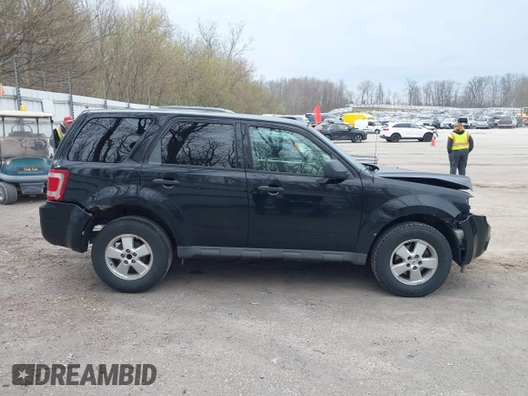 2009 Ford Escape XLS z VIN 1FMCU02759KA61417, wystawiony jako IAAI lot #42102452 z przebiegiem 207 262 mil mil oraz . Historia ofert i sprzedaży dostępna na DreamBid. Obrazek 13.