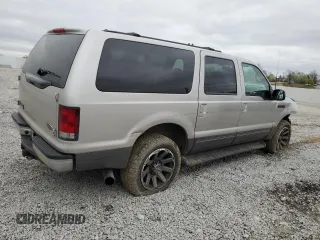 2002 Ford Excursion XLT with VIN 1FMNU41S22EC86209, listed as a Copart auction lot 51261065 with 202,942 mi miles and Salvage title. Bid and sale history available at DreamBid. Image 3.