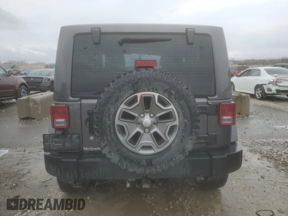 2014 Jeep Wrangler Rubicon with VIN 1C4BJWCG9EL189819, listed as a Copart auction lot 80522204 with 82,083 mi miles and Salvage title. Bid and sale history available at DreamBid. Image 6.