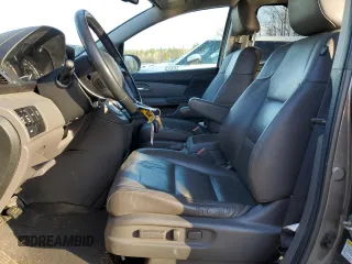 2014 Honda Odyssey EX-L with VIN 5FNRL5H66EB059115, listed as a Copart auction lot 81055334 with 173,410 mi miles and Salvage Title. Bid and sale history available at DreamBid. Image 7.