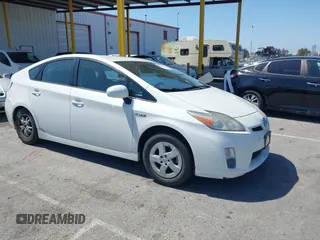 2010 Toyota Prius II z VIN JTDKN3DU8A0226619, wystawiony jako IAAI lot #42303693 z przebiegiem 123 068 mil mil oraz . Historia ofert i sprzedaży dostępna na DreamBid. Obrazek 1.