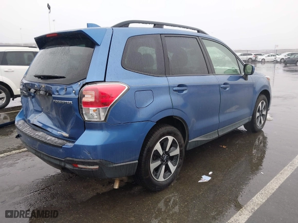 2018 Subaru Forester Premium with VIN JF2SJAEC9JH576012, listed as a IAAI auction lot 41512545 with 94,121 mi miles. Bid and sale history available at carsss.com. Image 4.