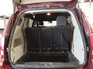 2019 Dodge Grand Caravan SXT with VIN 2C4RDGCG9KR678235, listed as a IAAI auction lot 41864931 with 127,848 mi miles and . Bid and sale history available at DreamBid. Image 17.