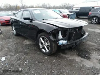 2022 Dodge Charger SXT with VIN 2C3CDXJG3NH206345, listed as a IAAI auction lot 40844458 with 49,387 mi miles. Bid and sale history available at carsss.com. Image 1.