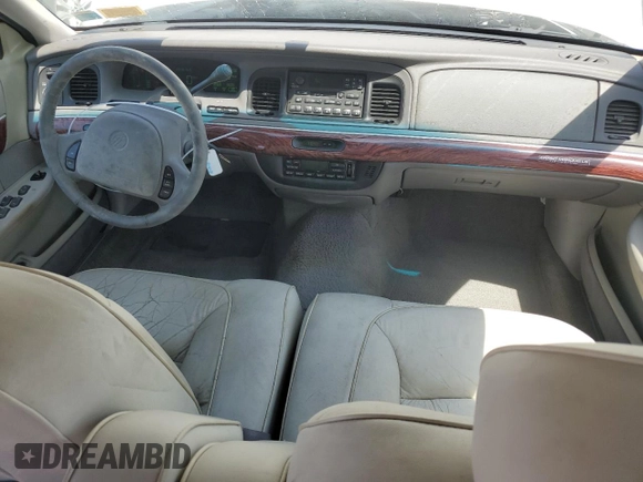 2000 Mercury Grand Marquis LS z VIN 2MEFM75W3YX689886, wystawiony jako Copart lot #54128735 z przebiegiem 54 819 mil mil oraz Szkoda całkowita • Salvage title. Historia ofert i sprzedaży dostępna na DreamBid. Obrazek 8.