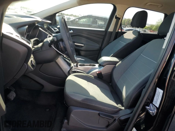2013 Ford Escape SE with VIN 1FMCU0GX8DUA38056, listed as a Copart auction lot 57617885 with 128,467 mi miles and Salvage title. Bid and sale history available at DreamBid. Image 7.