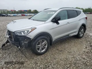 2017 Hyundai Santa Fe 2.4L z VIN 5XYZUDLB8HG500297, wystawiony jako Copart lot #58005165 z przebiegiem 91 871 mil mil oraz Szkoda całkowita • Salvage title. Historia ofert i sprzedaży dostępna na DreamBid. Obrazek 1.