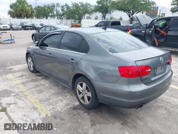 2013 Volkswagen Jetta TDI w/Premium with VIN 3VWLL7AJ4DM351806, listed as a IAAI auction lot 42654515 with 146,910 mi miles and . Bid and sale history available at DreamBid. Image 3.