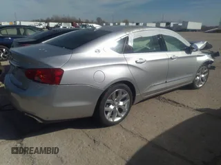 2015 Chevrolet Impala LTZ with VIN 1G1155SL8FU145775, listed as a IAAI auction lot 40390001 with 95,612 mi miles and . Bid and sale history available at DreamBid. Image 4.