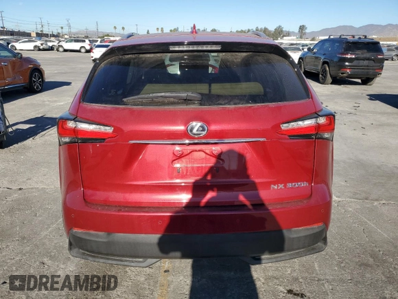 2015 Lexus NX 300h with VIN JTJBJRBZ2F2022484, listed as a Copart auction lot 84752004 with 58,950 mi miles and Salvage title. Bid and sale history available at DreamBid. Image 6.