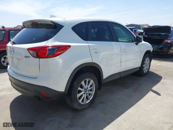 2014 Mazda CX-5 Touring with VIN JM3KE2CY2E0426164, listed as a IAAI auction lot 41812932 with 186,015 mi miles. Bid and sale history available at carsss.com. Image 4.