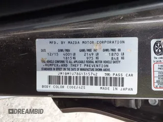 2016 Mazda 3 i Sport with VIN JM1BM1U78G1315742, listed as a IAAI auction lot 41716463 with 122,986 mi miles and . Bid and sale history available at DreamBid. Image 9.