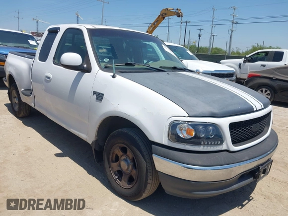1999 Ford F-150 with VIN 1FTRX07W0XKA01385, listed as a IAAI auction lot 42247809 with 147,105 mi miles and . Bid and sale history available at DreamBid. Image 1.