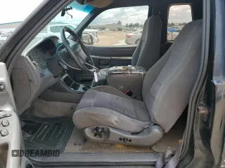 1999 Ford Explorer Sport z VIN 1FMYU22X9XUC03819, wystawiony jako Copart lot #69840564 z przebiegiem 214 315 mil mil oraz Szkoda całkowita • Salvage title. Historia ofert i sprzedaży dostępna na DreamBid. Obrazek 7.